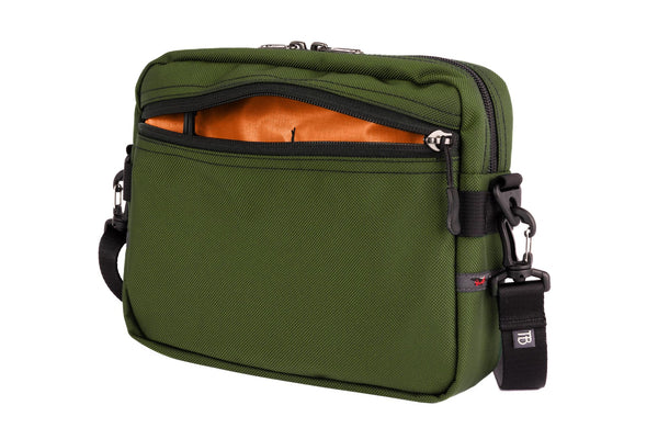 The Side Kick in Saguaro (olive green) 630 Ballistic with a Persimmon (dark orange with orange grid) 210 Cerylon interior.